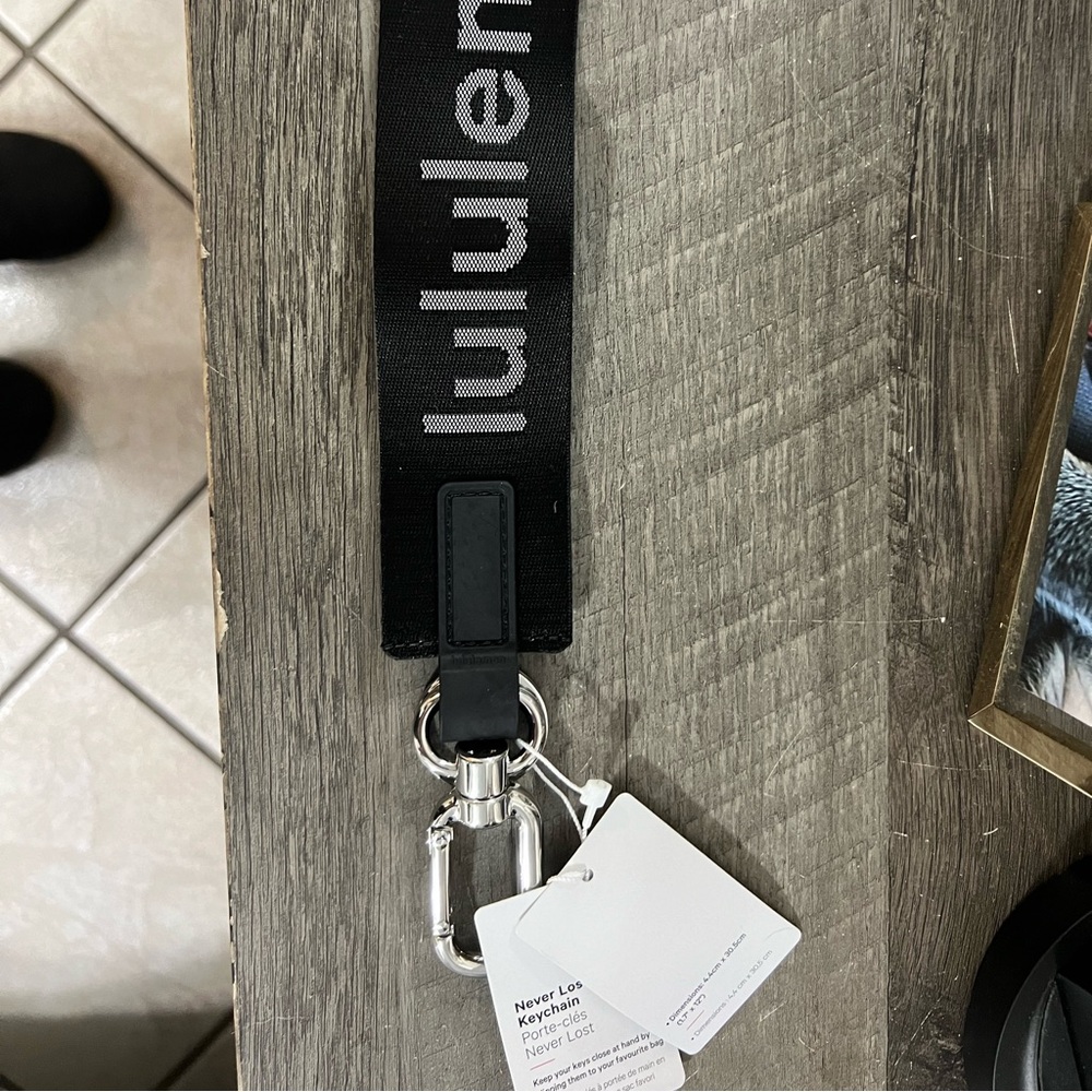 Black-and-white never lost Lululemon keychain new with tags